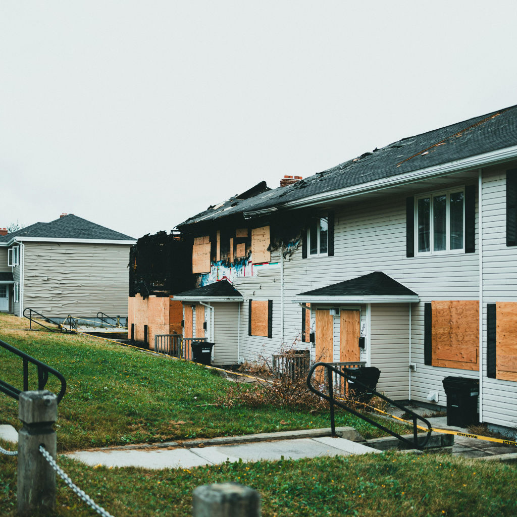 Roof tarping in Las Vegas home after high winds caused storm damage